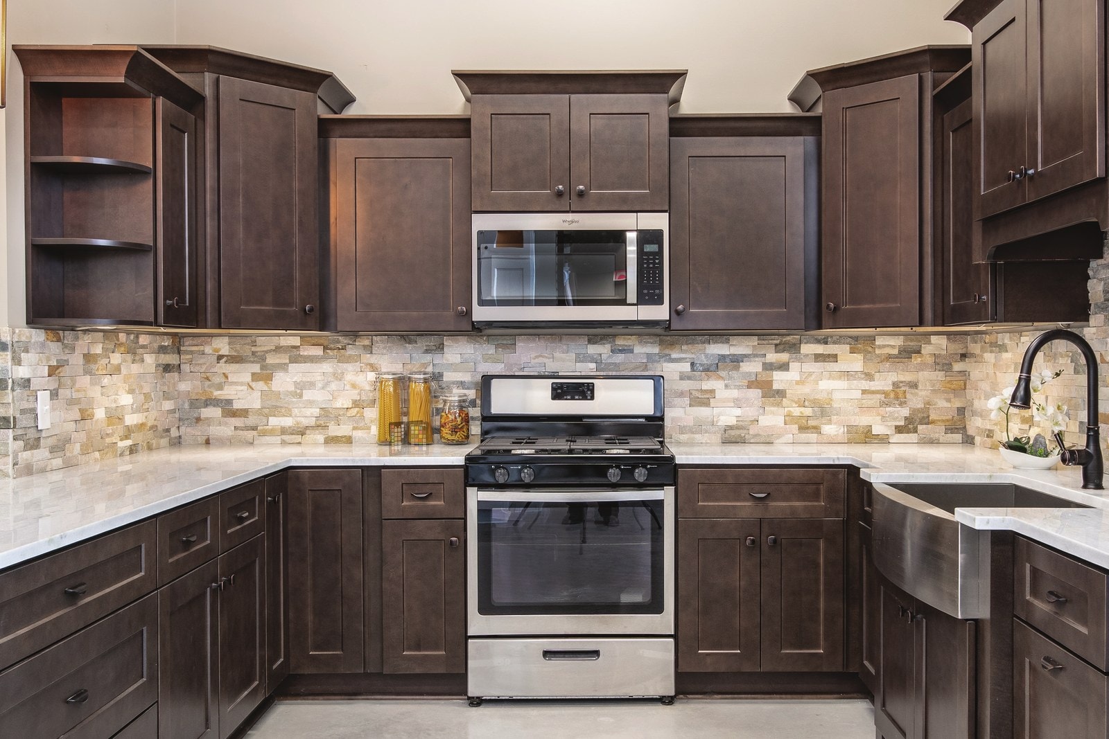Charcoal Gray kitchen cabinets by NKBC
