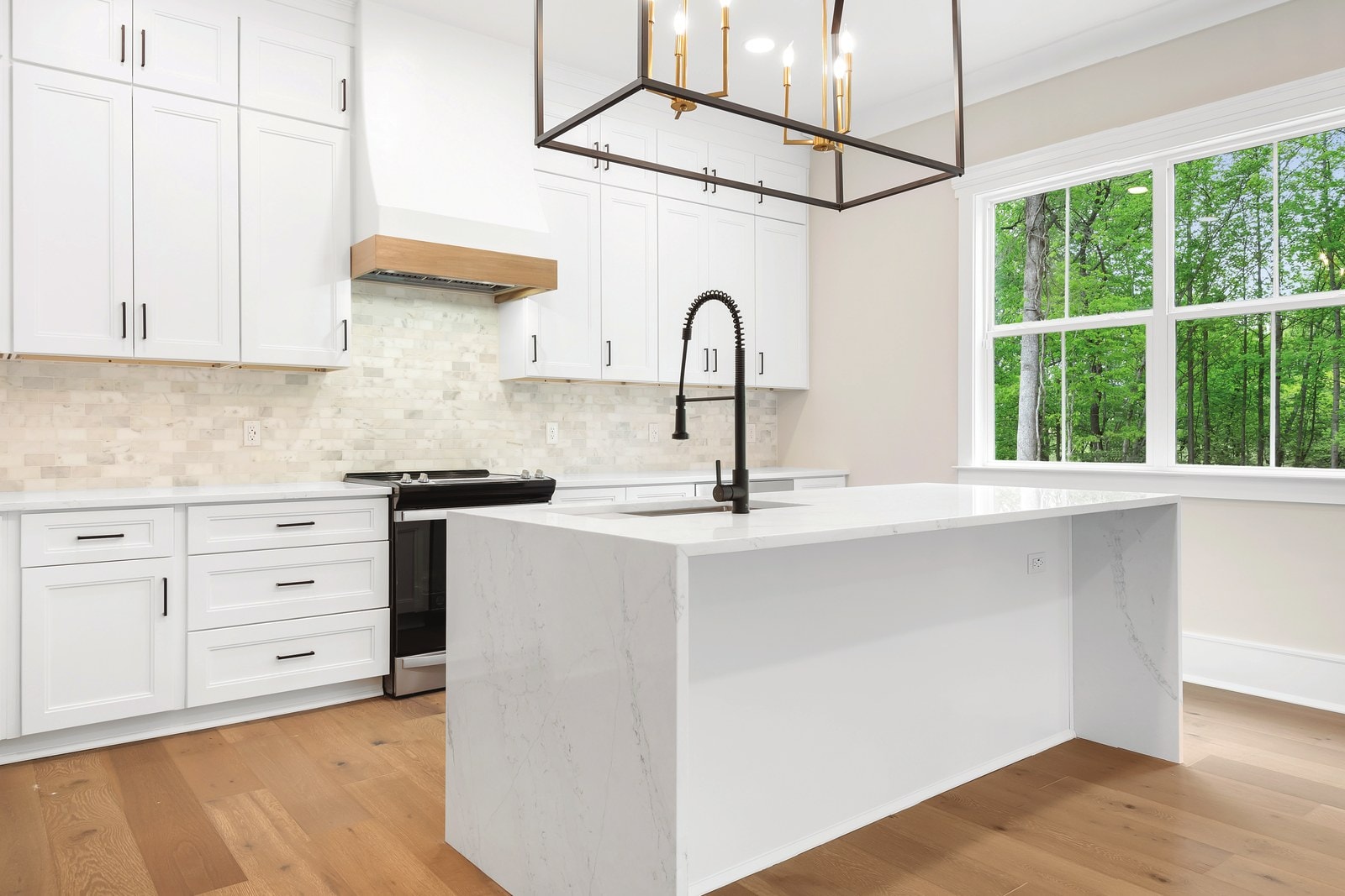 Double White kitchen cabinets by NKBC