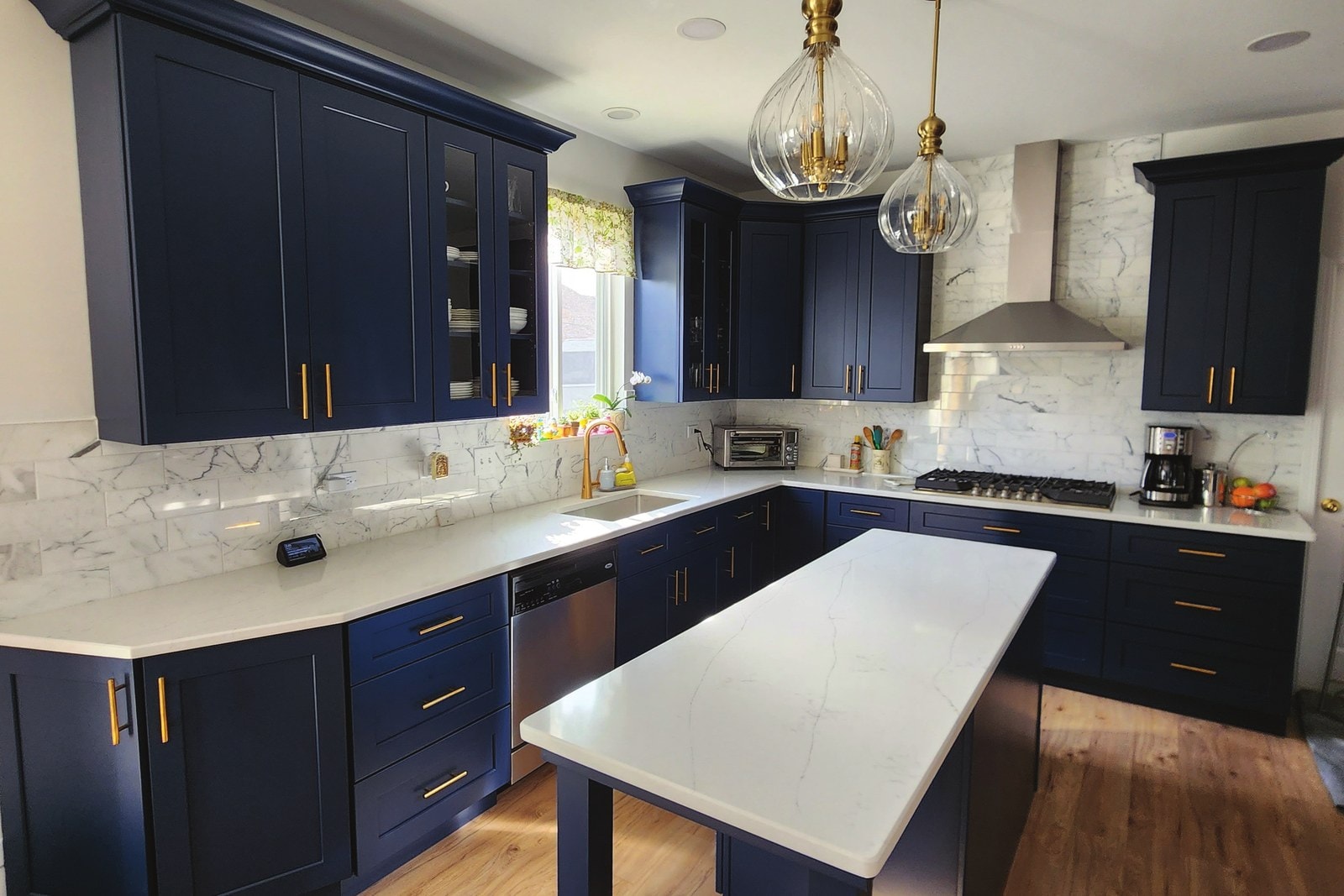 Shaker Blue kitchen cabinets by NKBC